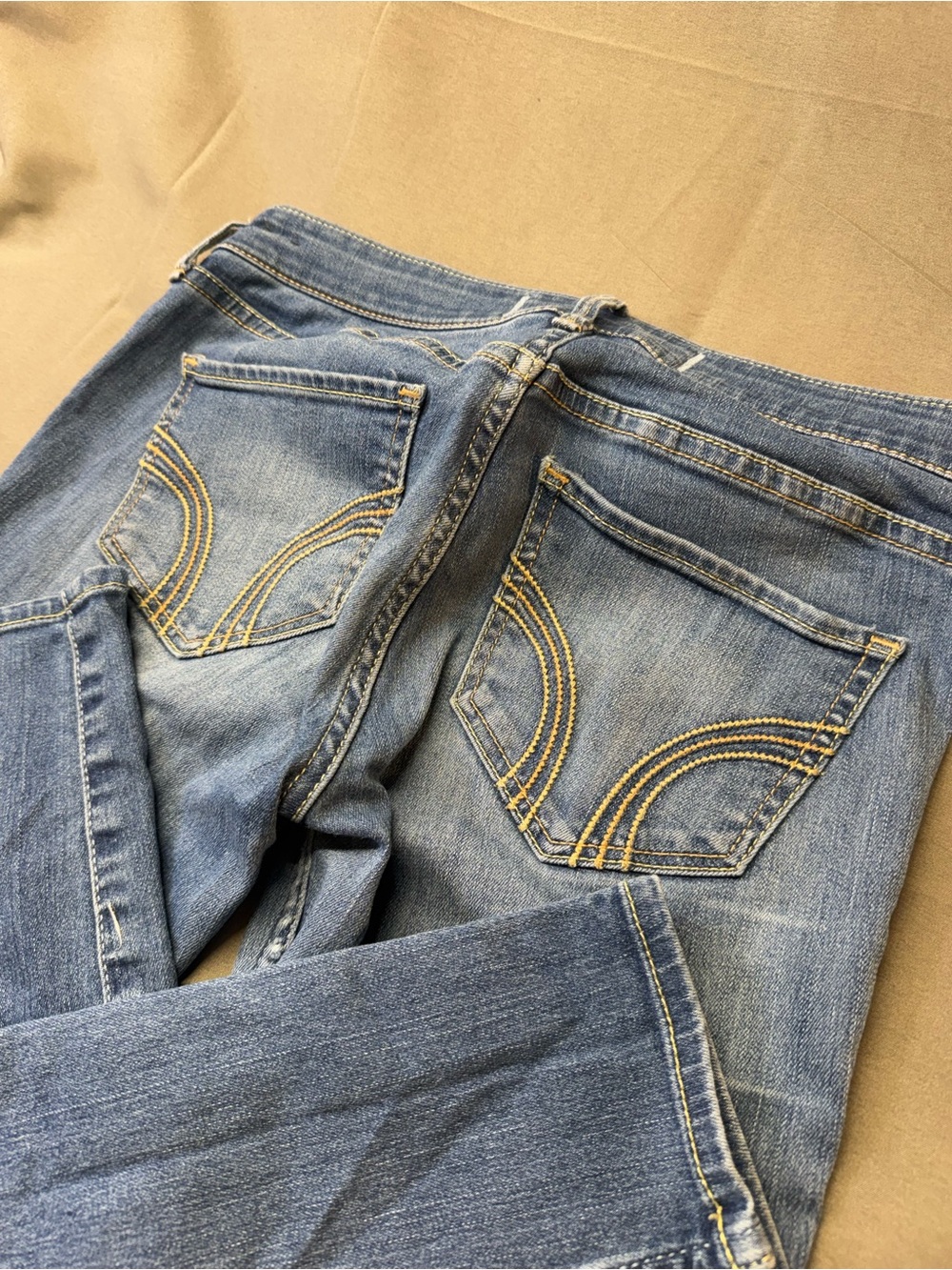 Hollister Women's Mid Blue Skinny Jeans with Curved Pocket Stitching
